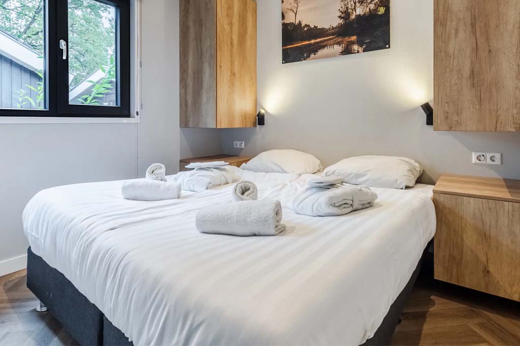 Woonkamer van de 6-persoons Pool Lodge